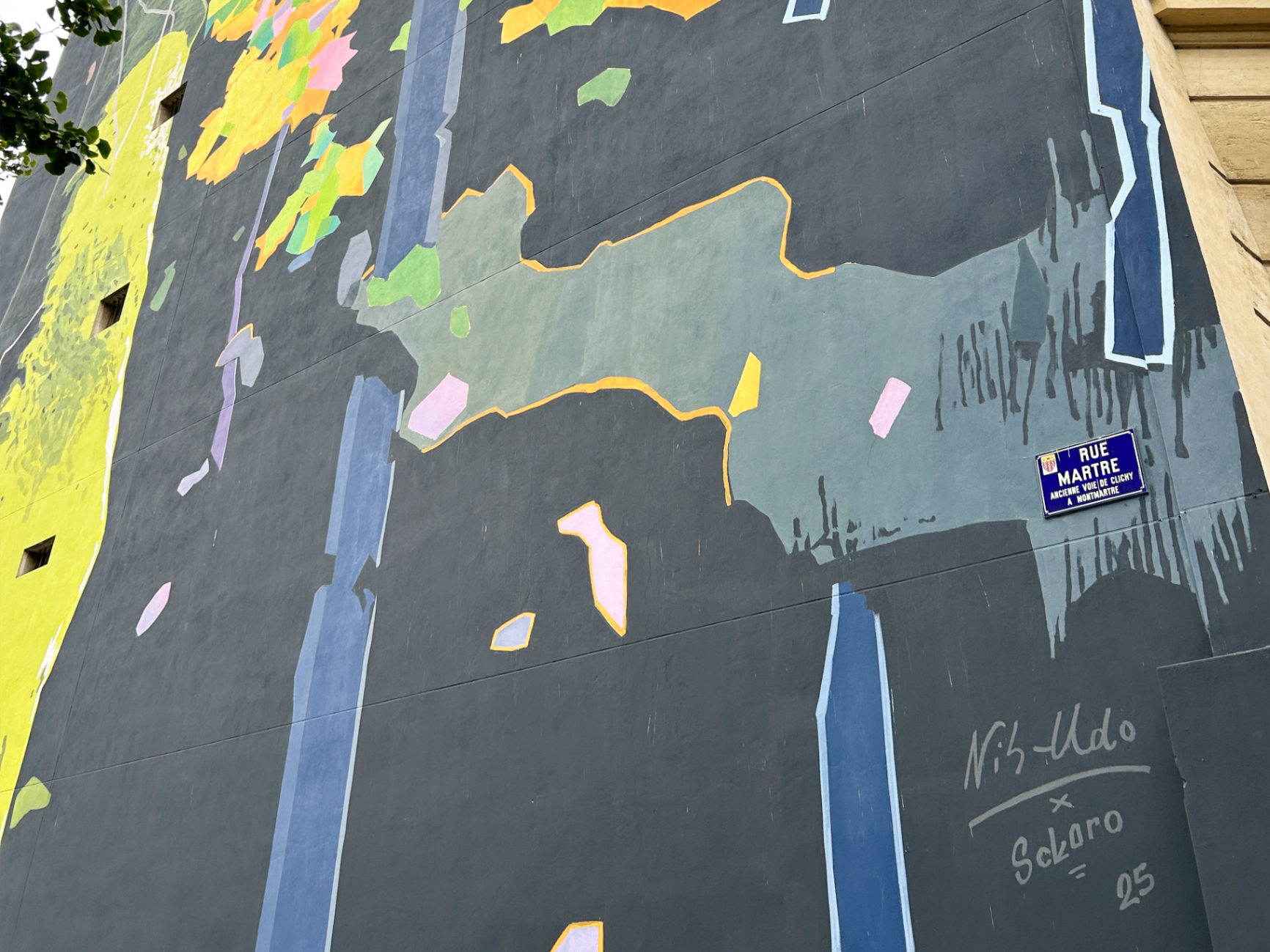 Détail de la fresque sur le pignon de la rue Martre à Clichy